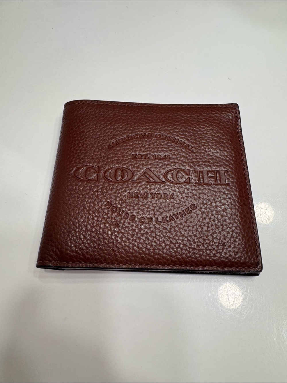 COACH Men's Dark Brown Pebbled Leather Bi-Fold Wallet